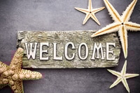 Preview: Welcome Sign with Starfish on Gray Background