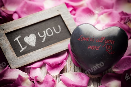 Preview: Pink Rose Petals With The Words "I Love You" And Heart.