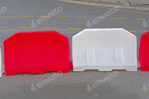 Preview: Red And White Plastic Road Fence On A Street
