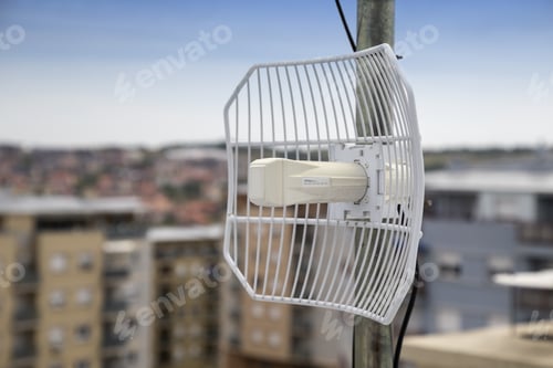 Preview: Parabolic Grid Antenna On Apartment Building. Made With Shallow Depth Of Field.
