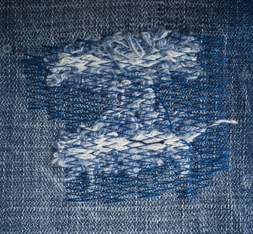 Preview: Blue Torn Denim Jeans Texture With Space For Text