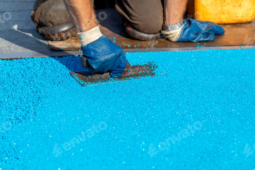 Preview: Mason Leveling Rubber Coating For Playgrounds Applied On The Surface By A Steel Trowel. Pdm Rubber