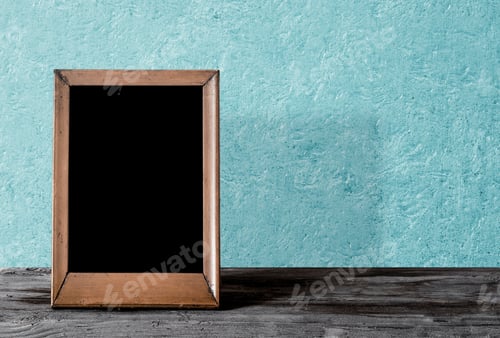 Preview: Wooden Photo Frame On Table, Blue Wall