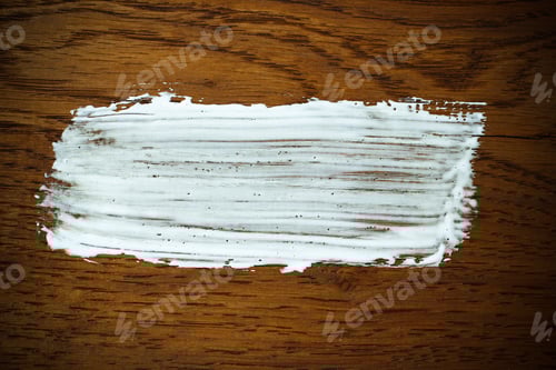 Aperçu: Coup de
pinceau blanc sur fond en bois. Effet de vignettage. Emplacement pour le texte