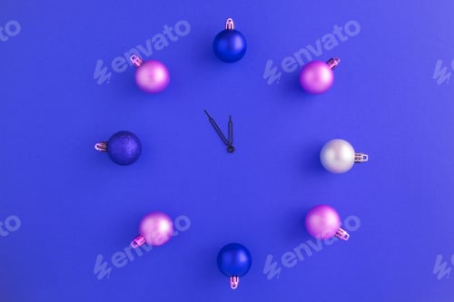 Preview: Christmas Watch From Colorful Balls In The Center Of Blue Surface. Top View.