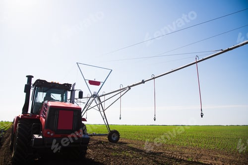 Preview: Automated Farming Irrigation Sprinklers System On Cultivated Agricultural Landscape Field