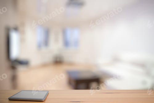 Preview: Tablet On Wooden Table In The Living Room