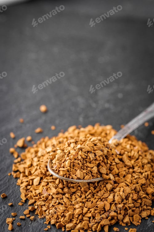 Preview: Instant Coffee Granules On A Dark Stone Background