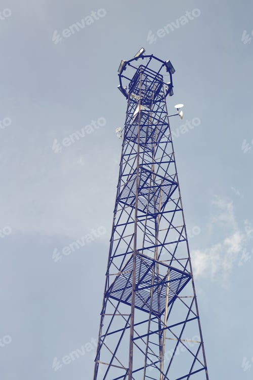 Preview: Old Metal Lighting Tower With Wifi Antennas On Sky Background. Vintage Style.