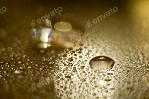 Preview: Yellow Cooking Oil Bubble And Drops On Water For Background.