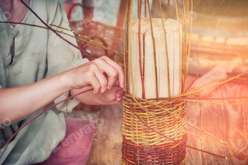 Preview: A Man Weaves A Basket Of Willow Branches. Master Basketmaker Creates At Work In The Studio.