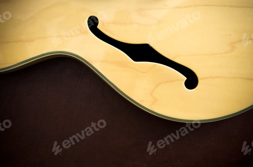 Preview: Guitar Body Detail With Sound F-Hole On Wooden Background, Vintage Look