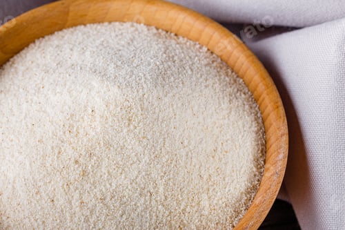 Preview: Natural Organic Semolina On Dark Wooden Rustic Background