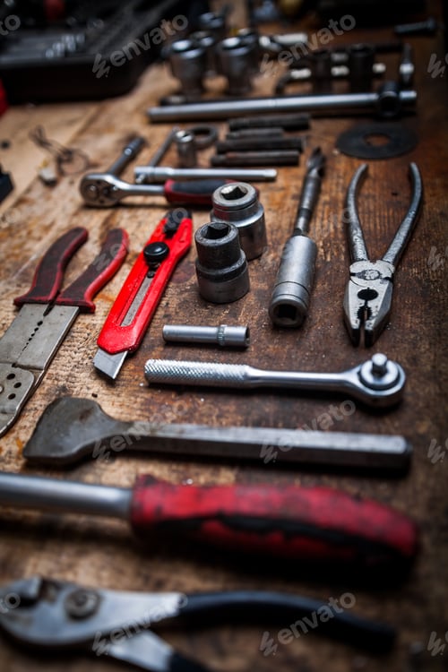 Preview: Color Image Of Many Tools On A Wooden Plank.