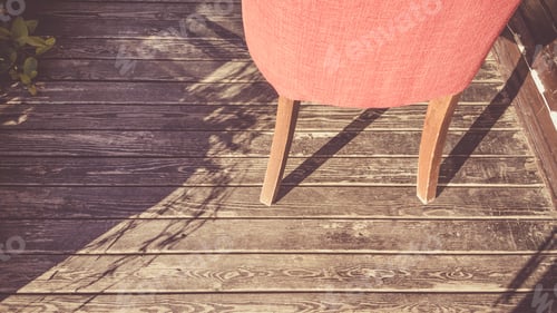 Preview: Modern Red Chair On A Worn Wooden Floor With The Summer Sunlight
