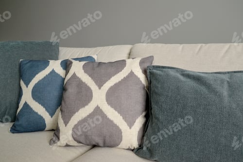Preview: Throw Pillows Lie On A Sofa. Living Room Interior Fragment