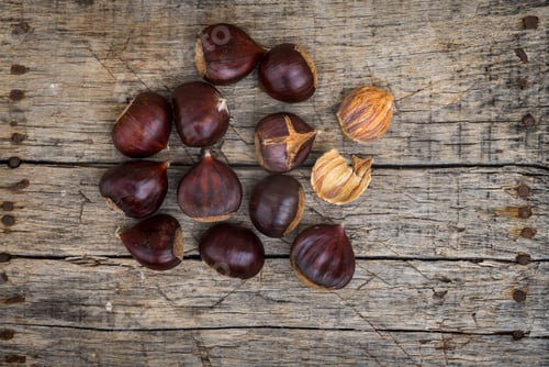Preview: Fresh Raw Chestnuts On A Wooden Background