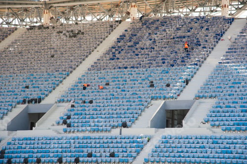 Preview: Stadium Construction. Construction Equipment And Workers On The Construction Of A Football Stadium