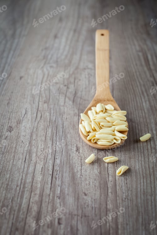Preview: Bunch Of Cavatelli Pasta On A Wooden Spoon
