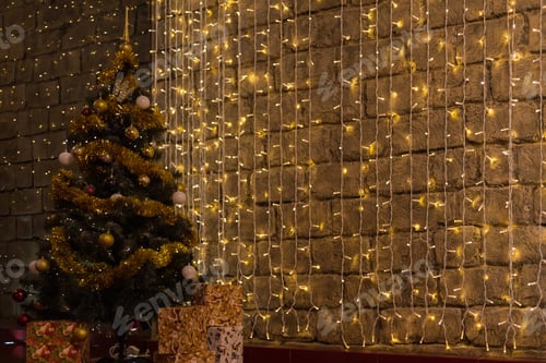 Preview: A Garland Decorated Christmas Tree Glows In The Dark. Festive Background With Copy Space For An