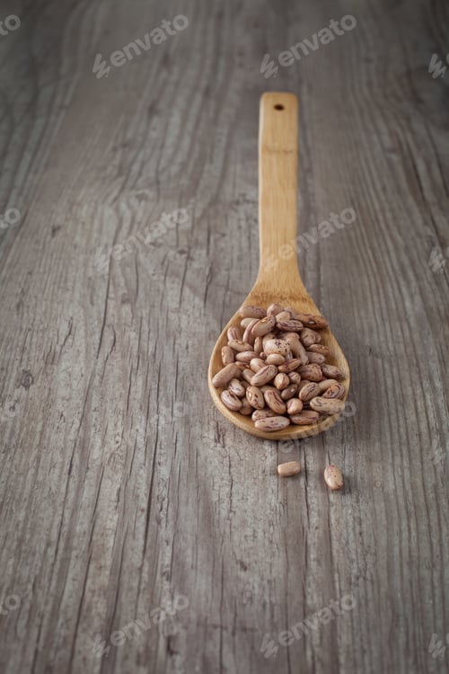 Preview: Bunch Of Fresh Raw Beans On A Wooden Spoon
