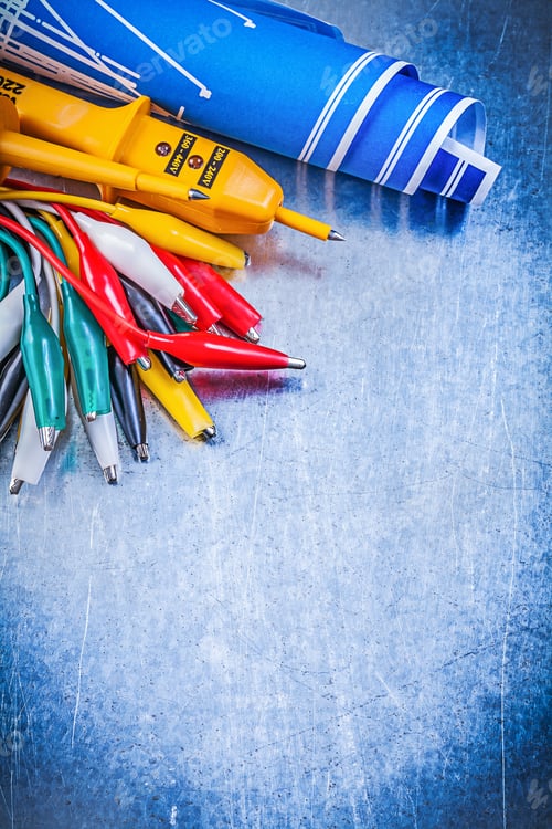 Preview: Yellow Electrical Tester Crocodile Cables Set Blue Construction Drawings On Metallic Background