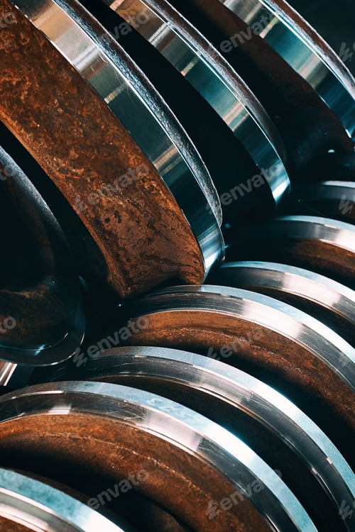 Preview: Closeup Of Round Metal Blanks For The Production Of Valves In The Factory. Industrial Background.
