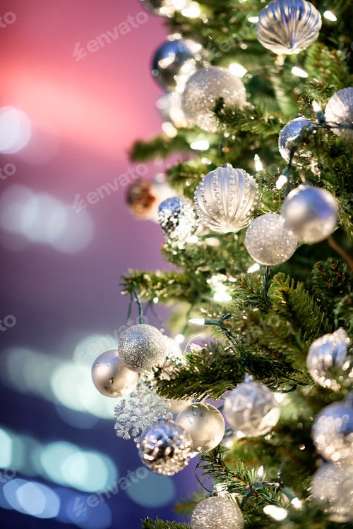 Preview: Christmas Tree At Night With Blurred Skyscrapers On Background.