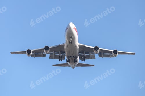 Preview: Passenger Airplane In The Sky With Blue Background