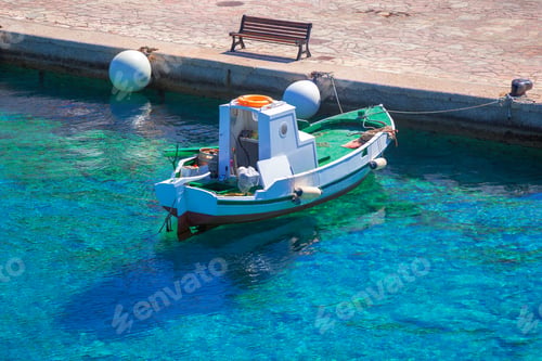 Preview: Fishing Boat In Port With Reflections Dock In Calm Sea Water, Tied To The Pier.