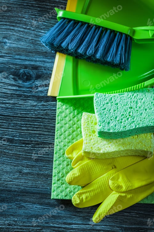 Preview: Dustpan Brush Sponges Protective Gloves Washcloth On Wooden Board.