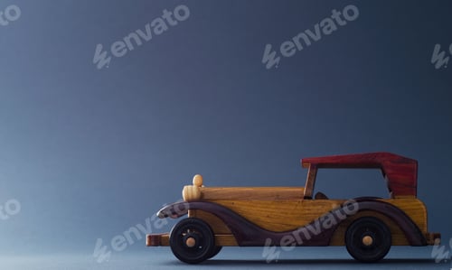 Preview: Vintage Wooden Toy Car Over Dark Blue Background, Image With Negative Space Or Copy Space.