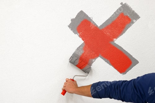 Preview: Worker Drew A Cross With A Roller On The White Wall