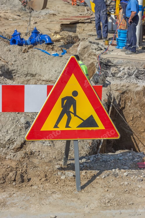 Preview: Traffic Sign For Construction Works In Street And Workers. Selective Focus.