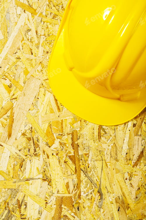 Preview: An Yellow Helmet On Plywood