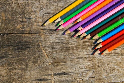 Preview: Colored Pencils On Old Wooden Background