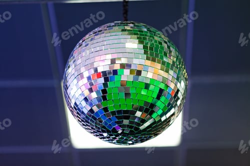 Preview: Disco Ball With Green Light Reflection And Part Of The Ceiling Background
