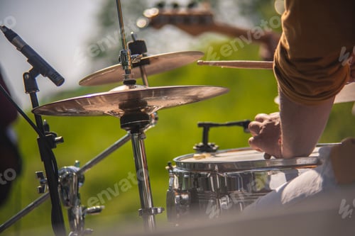 Preview: Still Life Of The Hands Of A Drummer Playing Live Drums At A Concert