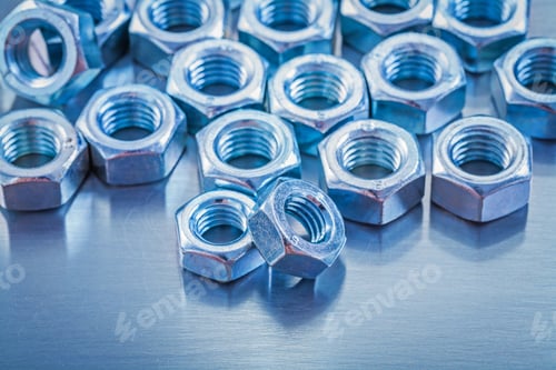 Preview: Composition Of Stainless Construction Nuts On Metallic Background Repairing Concept