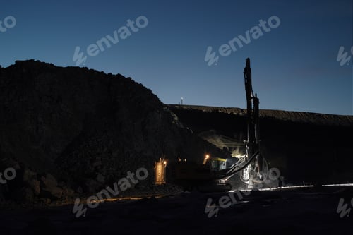 Preview: Mining Drilling Machine Working In The Slate Quarry At Night In Total Darkness In Low Light