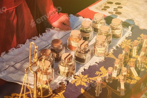 Preview: Ancient Shop Of A Seller Of Spices At The Historic Fair. The Hands Of The Seller Of Spice On The