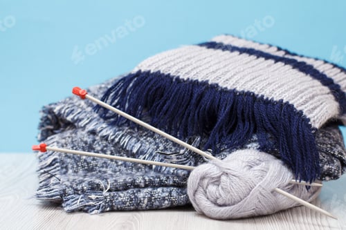 Preview: Wool Ball and Knitting Needles with Soft Blankets