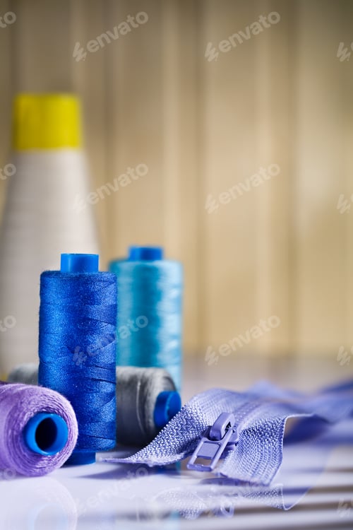 Preview: Sewing Spools And Zip On Table