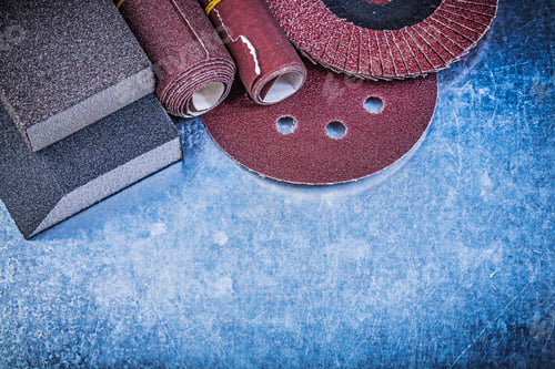 Preview: Collection Of Abrasive Tools On Scratched Metallic Background.