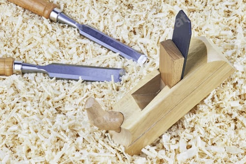 Preview: Two Chisels And One Spokeshave Lying In Wooden Shavings