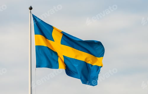 Preview: Large Swedish Flag Waving In The Breeze.