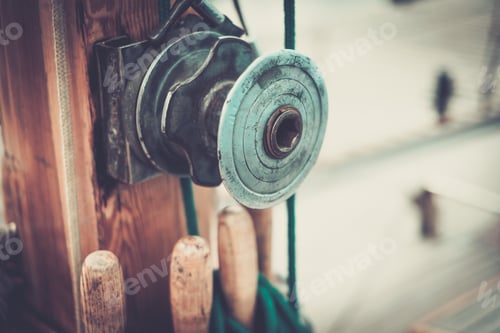Preview: Close up of Ship Rigging Winch and Wooden Pole
