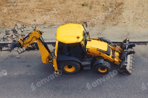 Preview: Excavator Uses A Jackhammer To Remove Old Asphalt From The Road