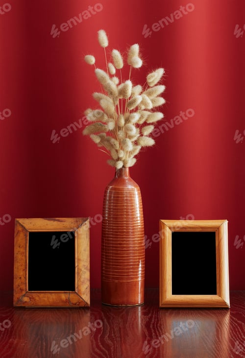 Preview: Vintage Photo-Frames And Ikebana On Table