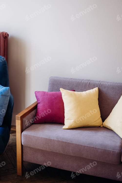 Preview: Purple Sofa With Pink And Yellow Pillows